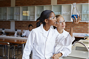 Two students in the lab ... doing Chemistry.