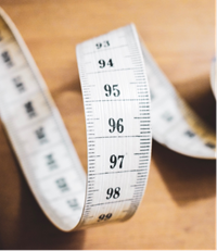 Measuring tape with cm and mm divisions shown.