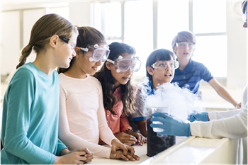 Chemistry as a verb - students and teacher doing chemistry