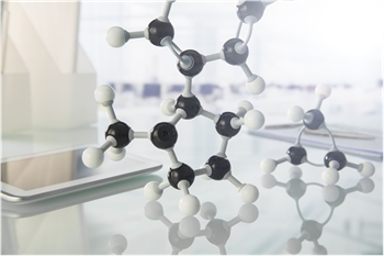 A physical model showing a molecule consisting of atoms of a couple different types.